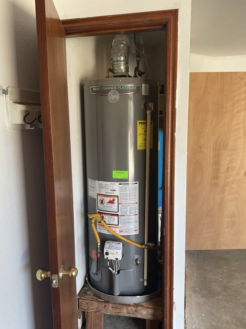 Installed Performance Platinum gas water heater in closet