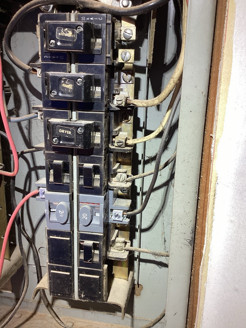 New electrical panel breakers properly installed and labeled.