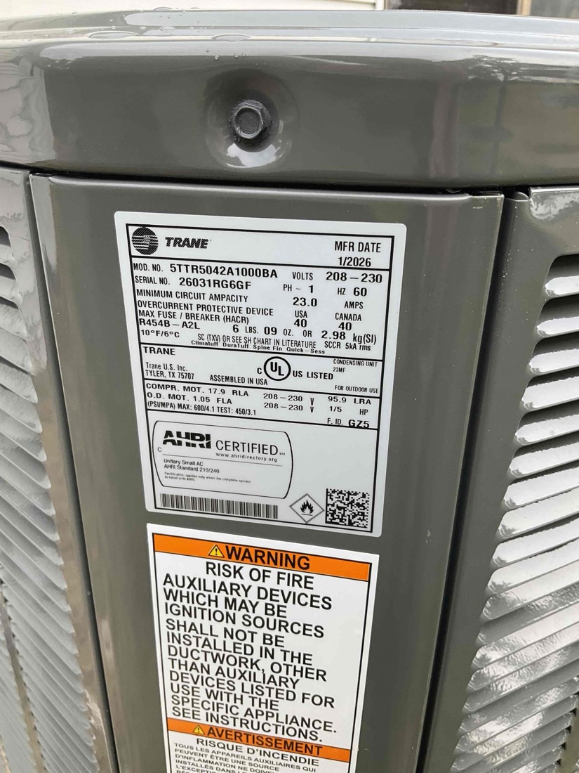 Trane air conditioning unit nameplate and specifications.