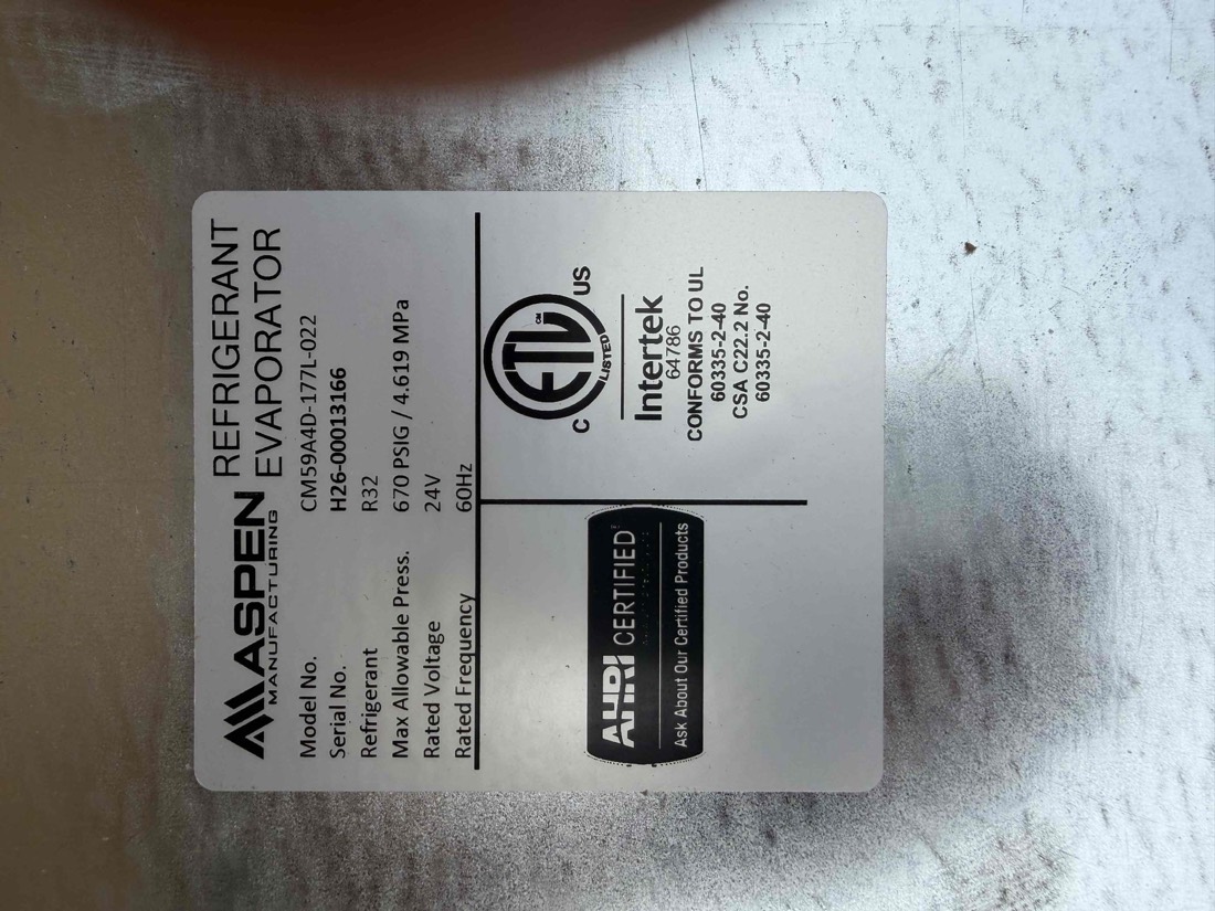 Aspen refrigerant evaporator certification label on installed equipment