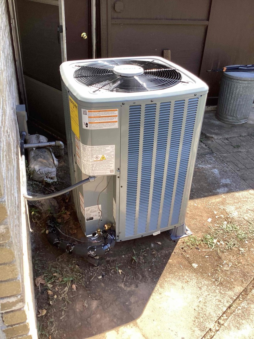 Newly installed outdoor AC condenser unit.