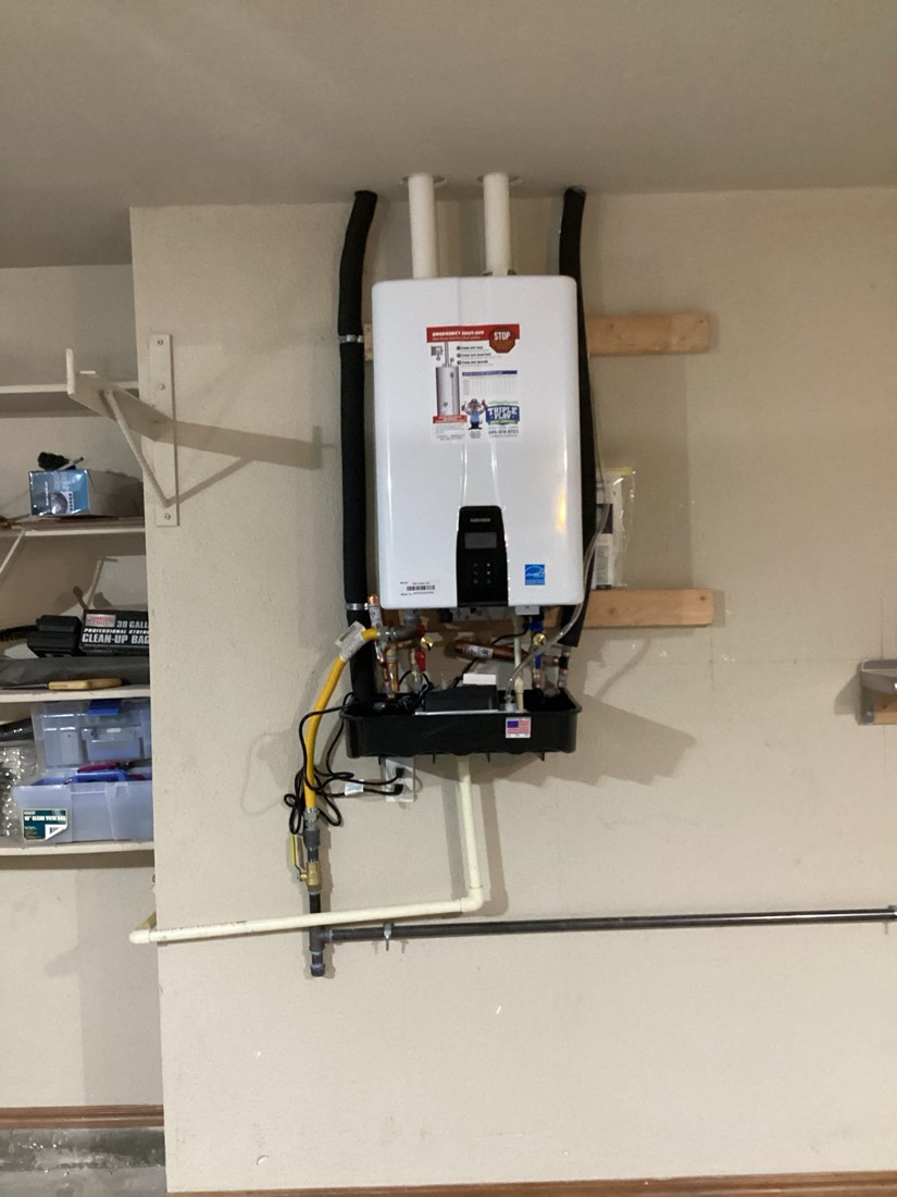 Tankless water heater fully installed with wooden mounting brackets